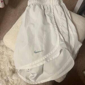 White Nike shorts